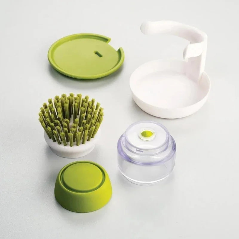 Washing-up brush with soap dispenser